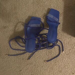 These are strapped up royal blue heals. Size 7.5 and need a new home!